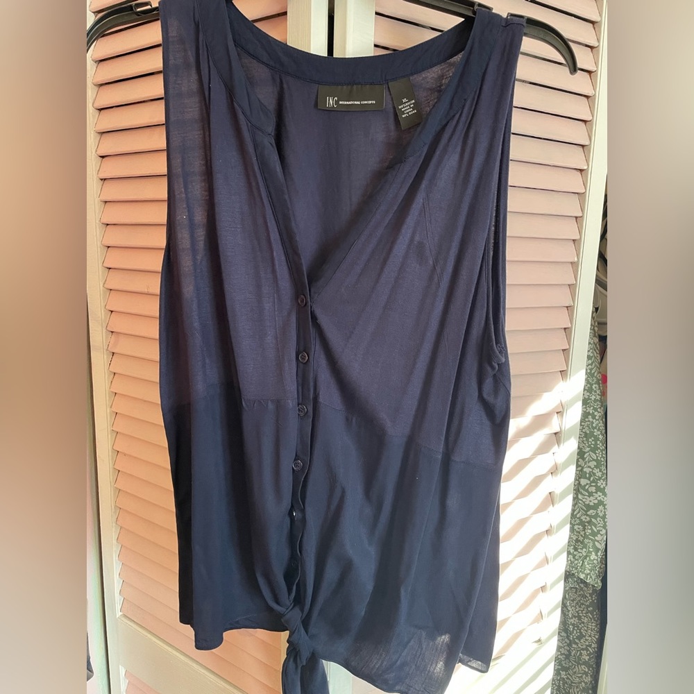 Great INC Navy blue sleeveless shirt. Picture show 2 small stain spots. Size xl